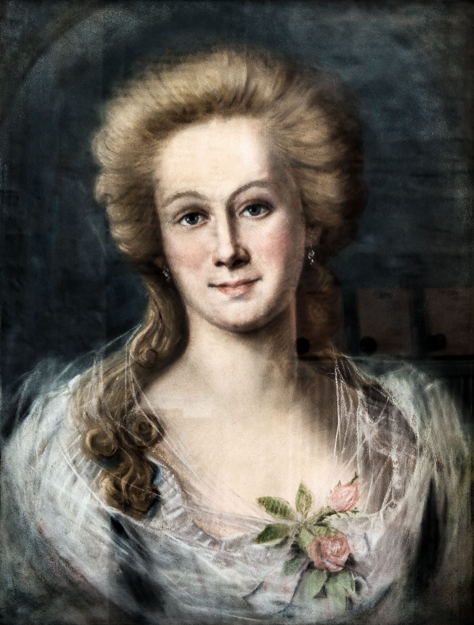 Gemaltes Bildnis Lili Schönemanns mit hoch aufgetürmtem Haar, im weißen Kleid mit einer Rose.